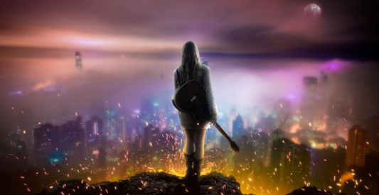 A girl with a guitar in the shadows overlooking a city lit in purples, pinks, and oranges at sunset